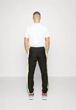 Lacoste Sport Tennis Pant Block - Trainingsbroek - Noir/Jaune/Blanc -Fashion Verkoop 04bb1a02e2f6431d8c645f07741a3373