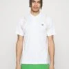 Lacoste Sport Tennis Tour - Poloshirt - Blanc/Orange -Fashion Verkoop 094609e3164843cab27ac9b3f13b6e89