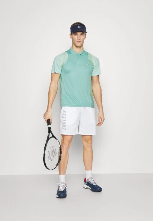 Lacoste Sport Tennis Tour - Poloshirt - Florida/Pastille Mint/Lima -Fashion Verkoop 09fec1433a5d4144baf80c02765828ca scaled