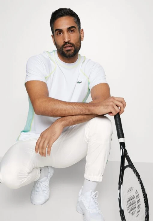 Lacoste Sport Tennis Pant - Trainingsbroek - Flour/Tarragon -Fashion Verkoop 12b7e41e235a4772977c6a6e74c8ee60 scaled