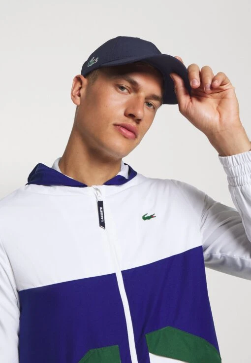 Lacoste Sport Tennis Unisex - Pet - Navy Blue -Fashion Verkoop 152fd118d63543148e36f97f42e7c7c4 scaled