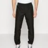 Lacoste Sport Tennis Pant Block - Trainingsbroek - Noir/Jaune/Blanc -Fashion Verkoop 166e843c78294468be5c224e5153300a