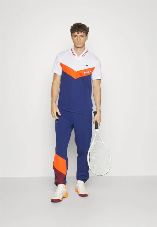 Lacoste Sport Tennis - T-Shirt Print - Blanc/Orange/Bordeaux/Bleu Marine -Fashion Verkoop 178640917b4b4141809bccb1767c195c scaled