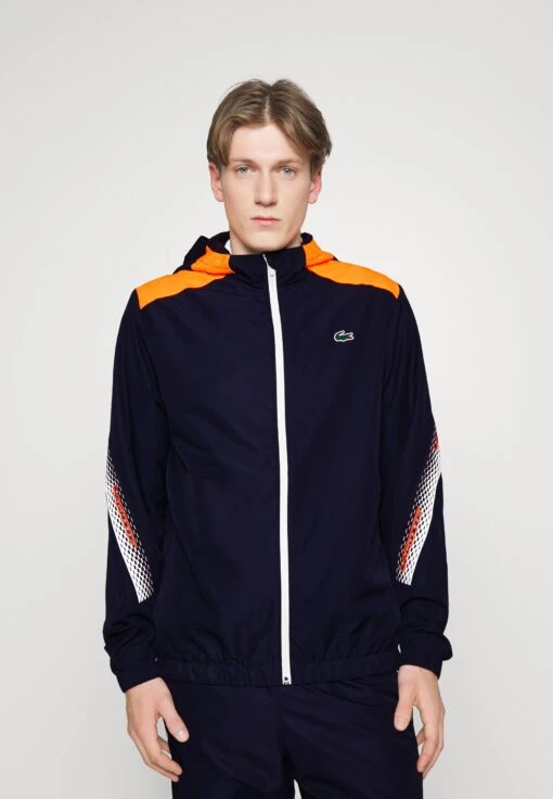 Lacoste Sport Tennis Jacket Tapered - Trainingsvest - Navy Blue/Flashy Orange Flourecend -Fashion Verkoop 203284e5006f421a9ea154adbddbf289 scaled