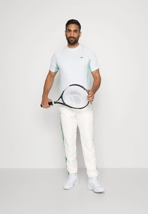 Lacoste Sport Tennis Pant - Trainingsbroek - Flour/Tarragon -Fashion Verkoop 223fd875f86d4995ba745ec52ace4e9b scaled