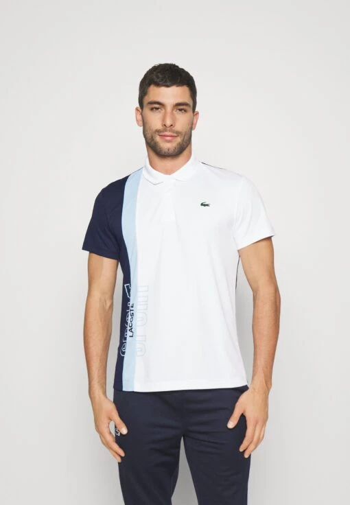 Lacoste Sport Tennis - Poloshirt - White/Navy Blue-Overview -Fashion Verkoop 40e4a80ed6e2435ea5698cdf6c16bed0 scaled