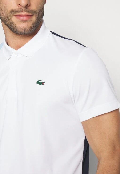 Lacoste Sport Tennis - Poloshirt - White/Navy Blue-Overview -Fashion Verkoop 5cfdf8677f184fc79e8c66f2806167d5 scaled