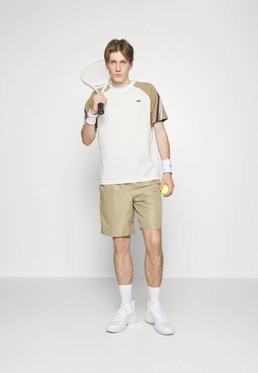 Lacoste Sport Tennis - Sport T-Shirt - Flour/Lion -Fashion Verkoop 605d625534374658a86bdee394e124d1 scaled