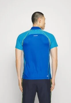 Lacoste Sport Tennis Tour - Poloshirt - Bleu Jaune -Fashion Verkoop 62b8a215bccd40bd9397b3dfc697a34a