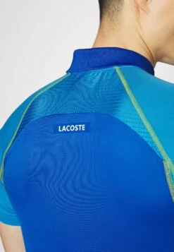 Lacoste Sport Tennis Tour - Poloshirt - Bleu Jaune -Fashion Verkoop 83c23a0936794774b8b8d261f479ec84