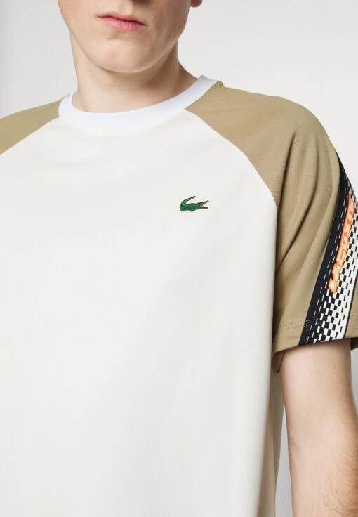 Lacoste Sport Tennis - Sport T-Shirt - Flour/Lion -Fashion Verkoop 8ed177cd4dca4af193266c8aa65411c8 scaled