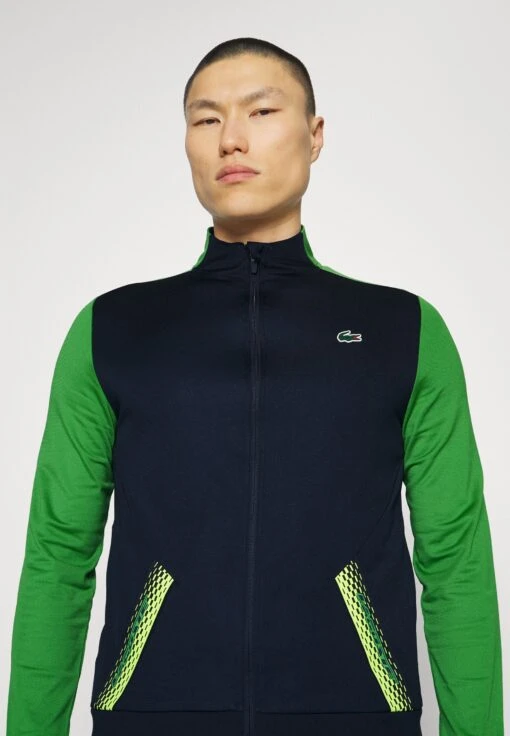 Lacoste Sport Tennis Jacket Tapered - Trainingsvest - Bleu Marine/Vert -Fashion Verkoop 92fe20a4858845cd8901991db389886a scaled