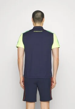 Lacoste Sport Tennis - Poloshirt - Bleu Marine/Vert/Jaune -Fashion Verkoop 98a26ac36e1d4c08bf14d97f7c5ec3dd