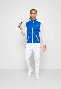 Lacoste Sport Tennis Jacket Tapered - Trainingsvest - Kingdom/Flour-Flour-Kingdom -Fashion Verkoop a0faed916a3e47b080eebf564058eeb7