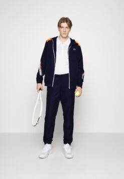 Lacoste Sport Tennis Jacket Tapered - Trainingsvest - Navy Blue/Flashy Orange Flourecend -Fashion Verkoop c8da99caa6294a1bb2c528ec18e540b3