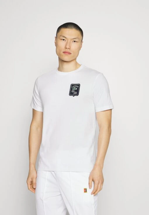 Lacoste Sport Tennis - Sport T-Shirt - White -Fashion Verkoop ce038af4d4884571a672b5c74e951a7e scaled