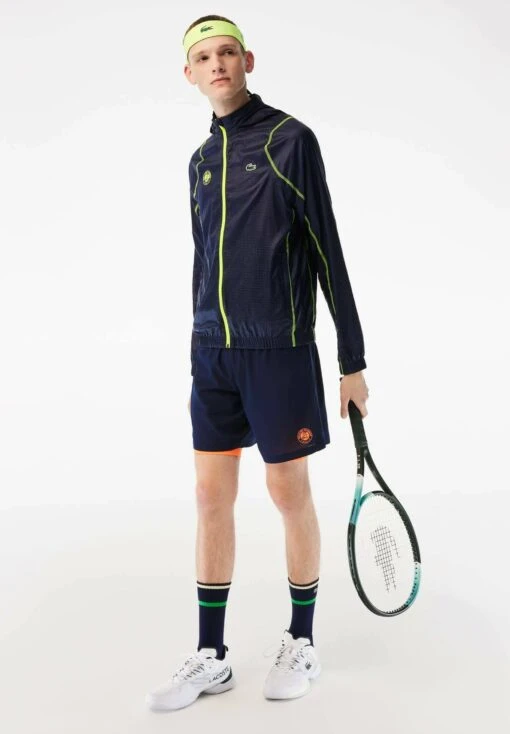 Lacoste Sport Tennis- Trainingsvest - Bleu Marine Jaune -Fashion Verkoop d179fc01cbf24a1b98cb13de33b87291 scaled